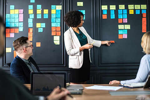 A group of people in a meeting