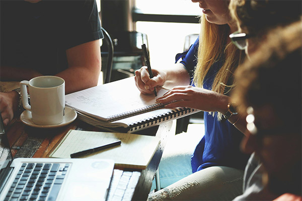 A Group Of People In A Meeting