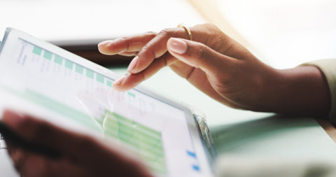 Person holding a tablet device