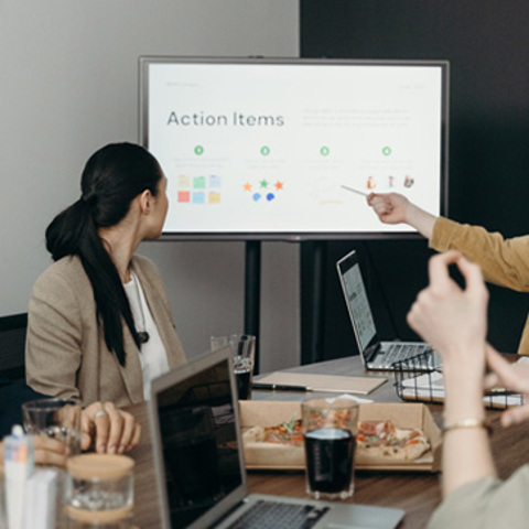 A group of people in a team meeting