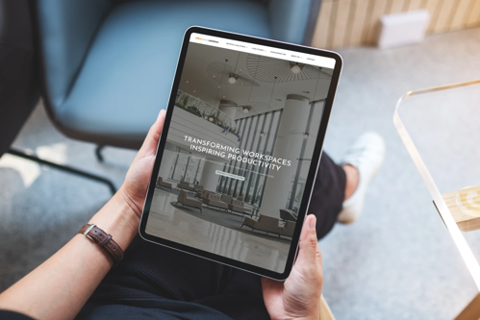 A person holding a tablet device