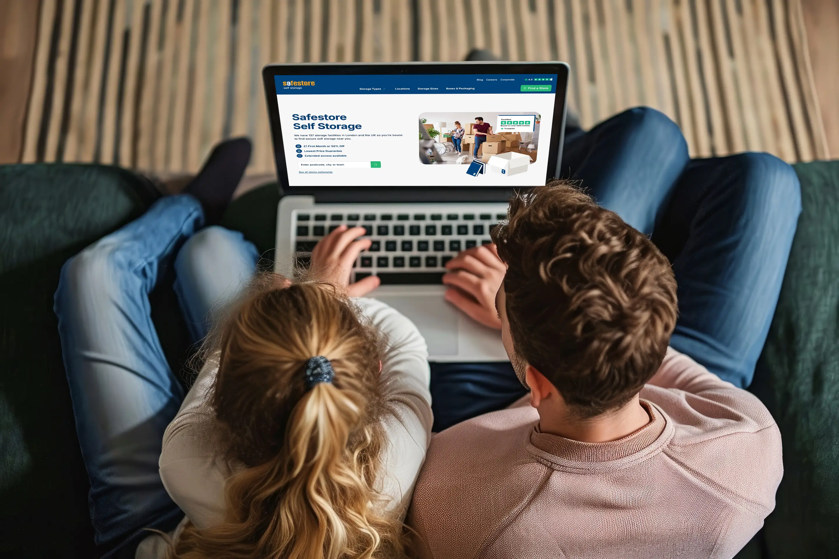 Safestore Feature Couple Sitting On Sofa With Laptop On Safestore Website @5Xl on Image Pods