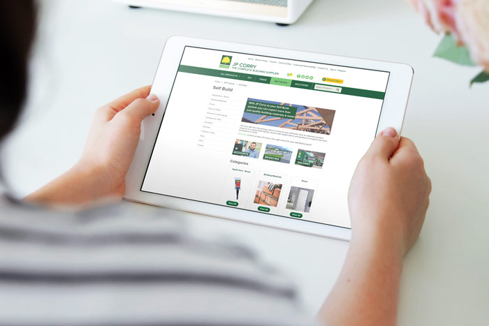 A Person Holding A Tablet Device